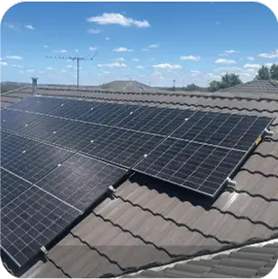 Solar panels installed on a commercial building roof, generating renewable energy