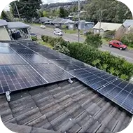 Solar panels installed on a residential rooftop, promoting clean energy use