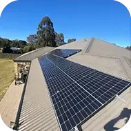 Solar panels installed on a residential property roof, powering the home with sustainable energy